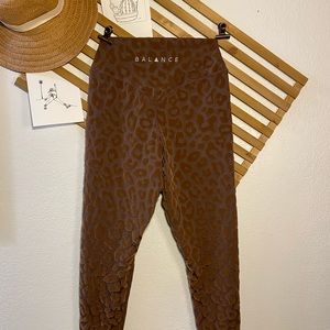 NWOT. Balance Athletica leggings. Brown animal print. Size small. Never worn